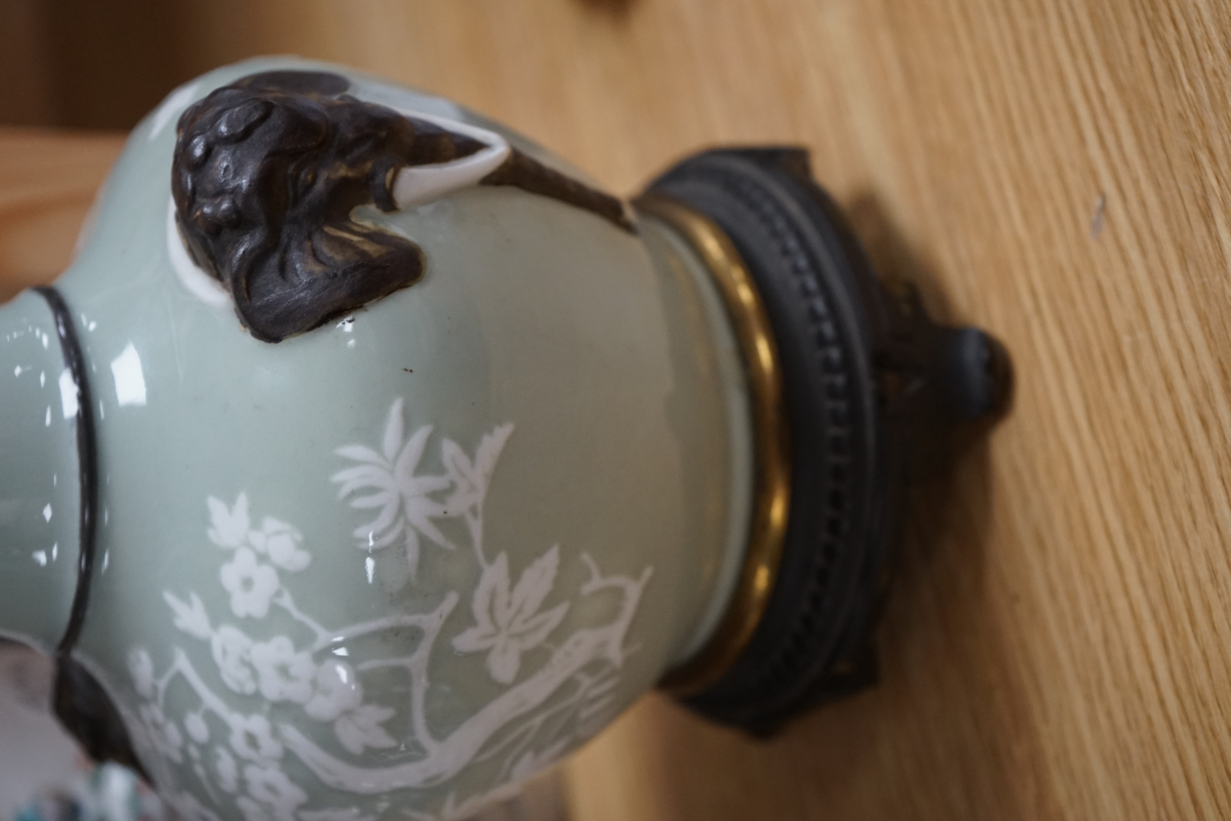 Four Chinese porcelain vases, one mounted as a lamp, 35cm